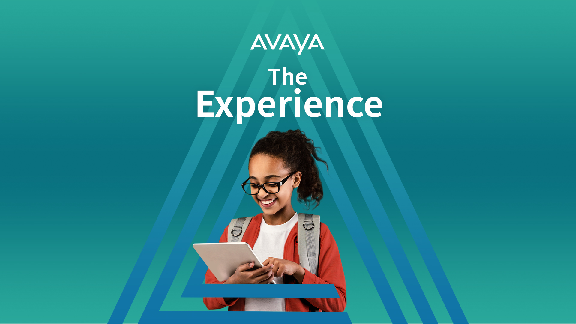 Young girl smiling and looking at ipad