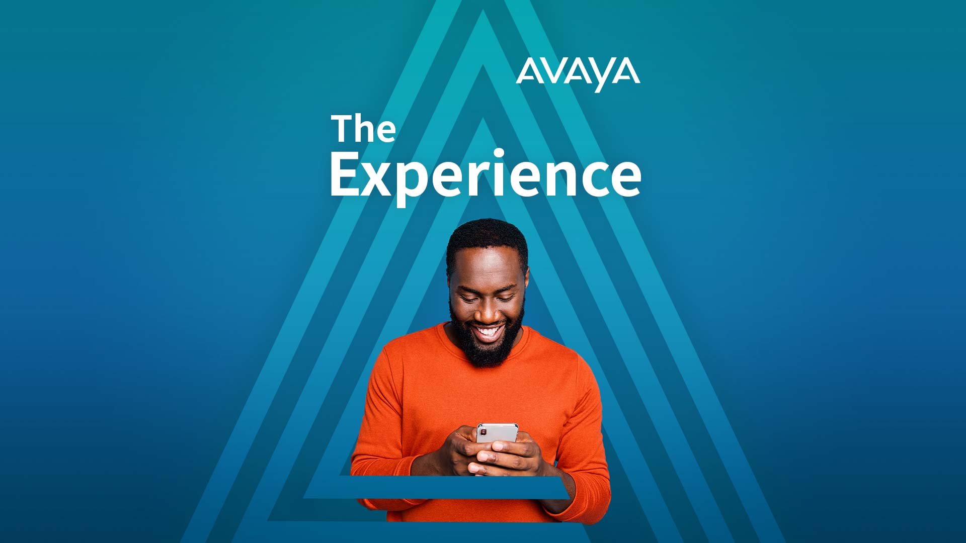 Man looking at iPhone and smiling 