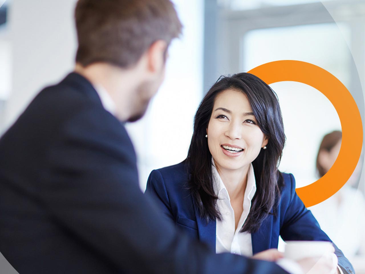 Two coworkers talking.