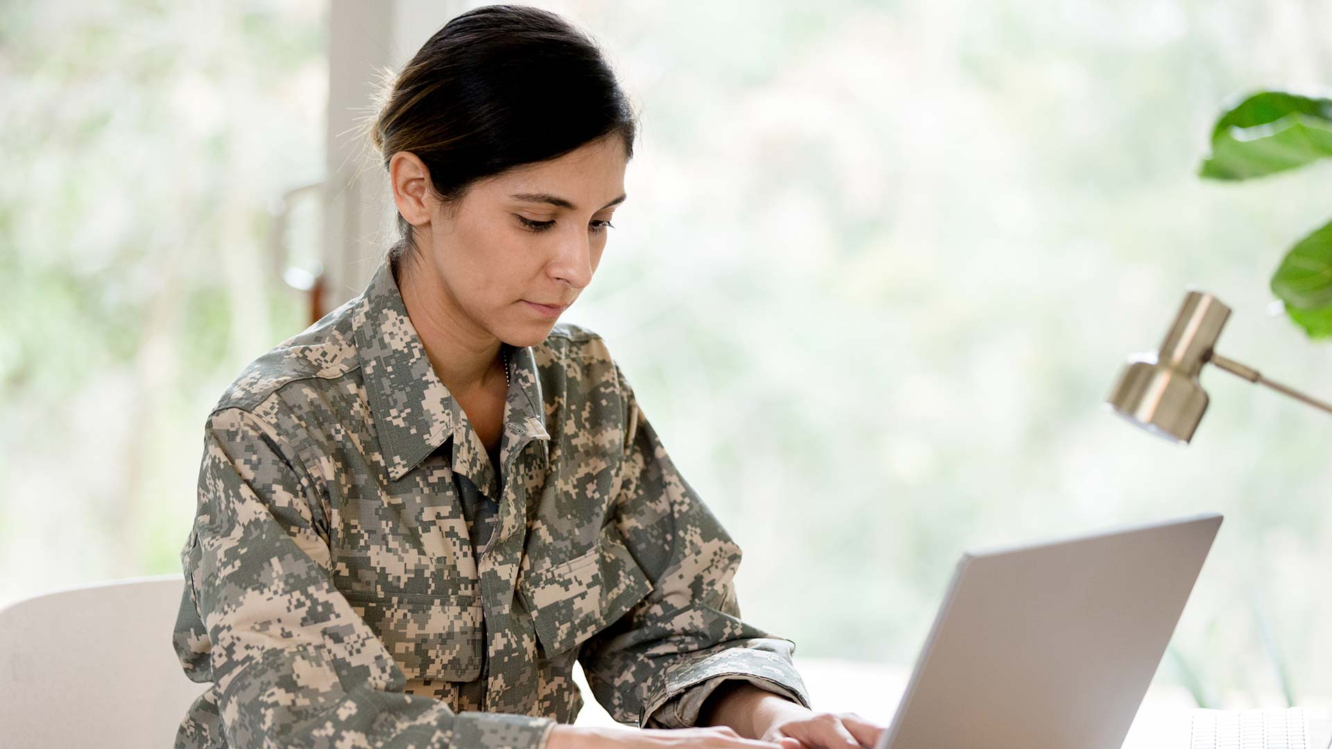 Soldier using a laptop
