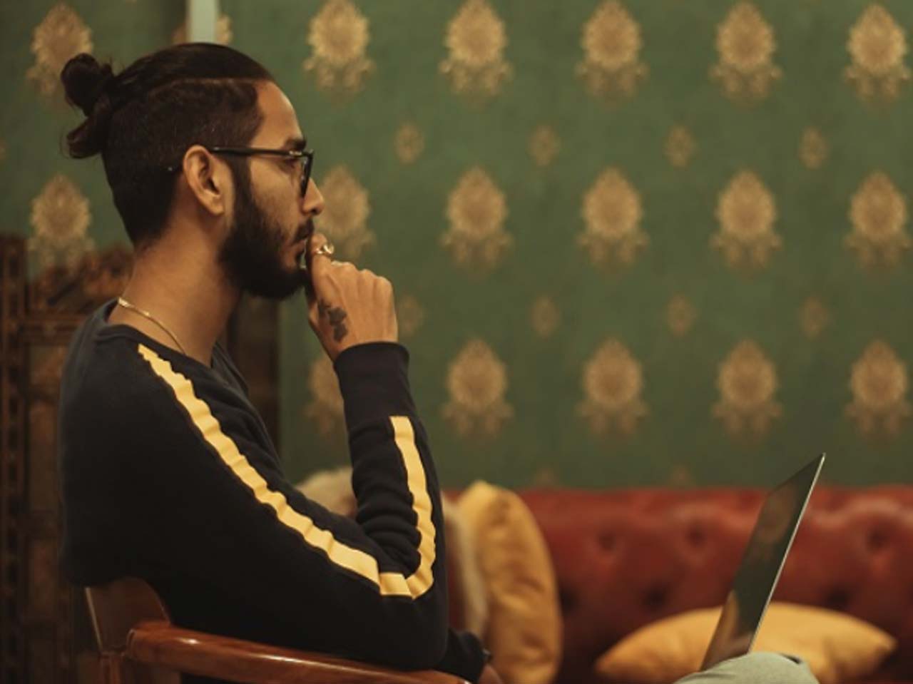 Man looking at laptop