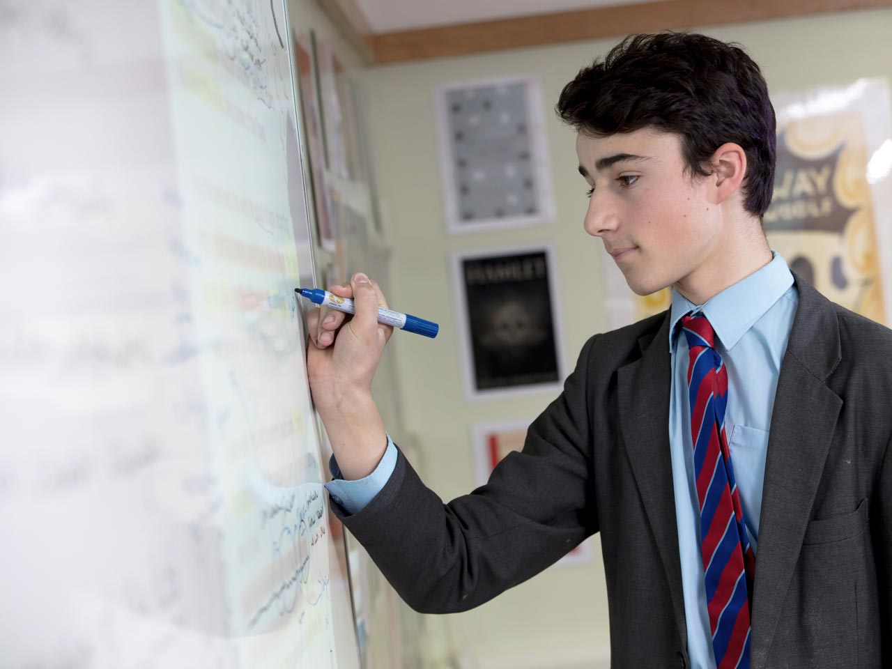 Man writing on whiteboard