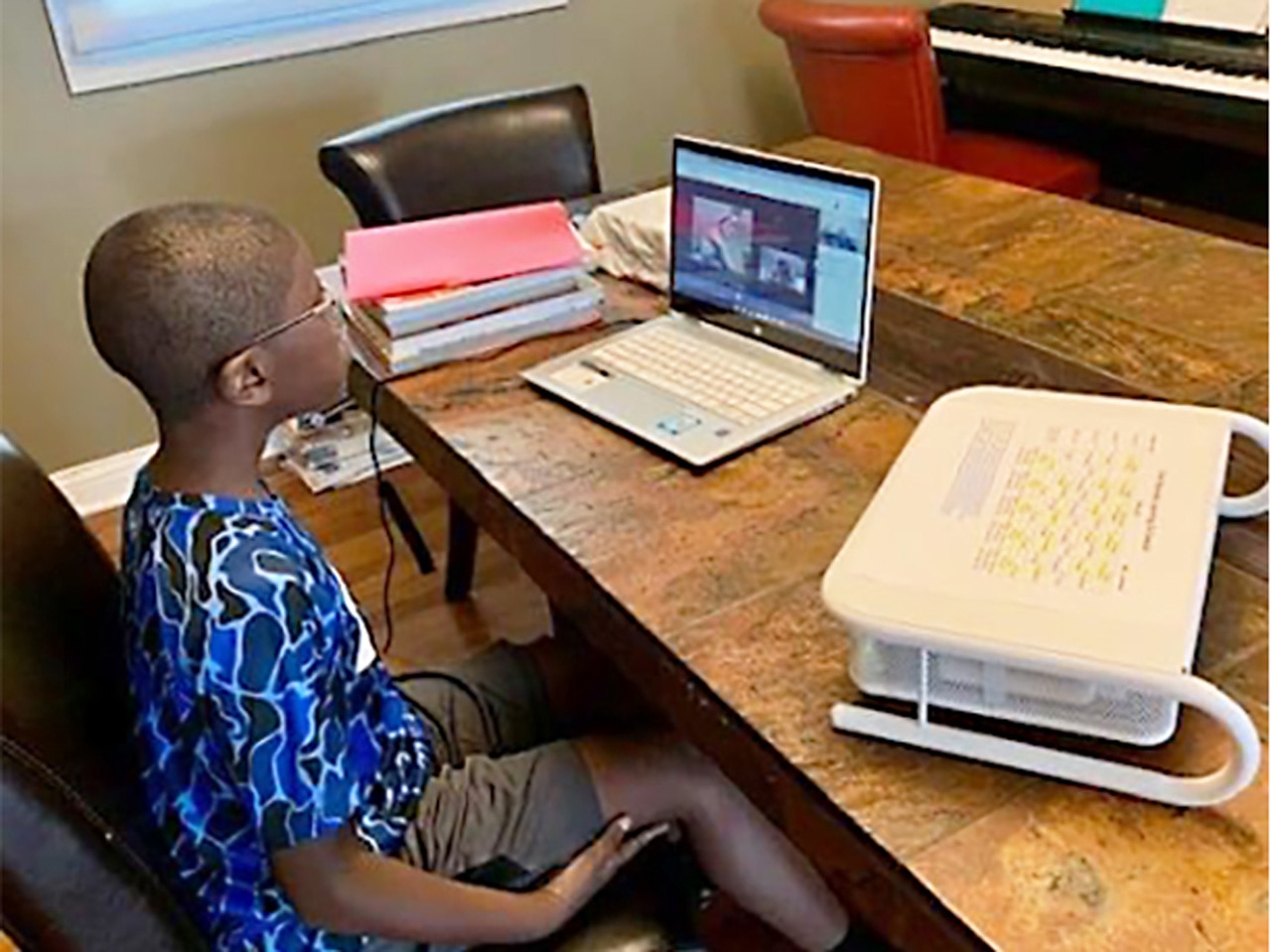 Child distance learning on a laptop