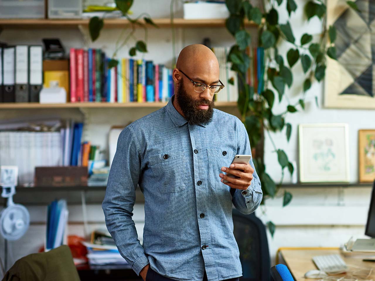 man reading a text message