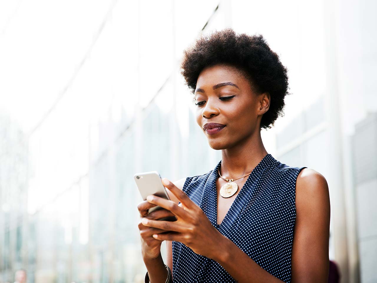 Woman using a cellphone.